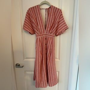 Salmon and white striped open back dress